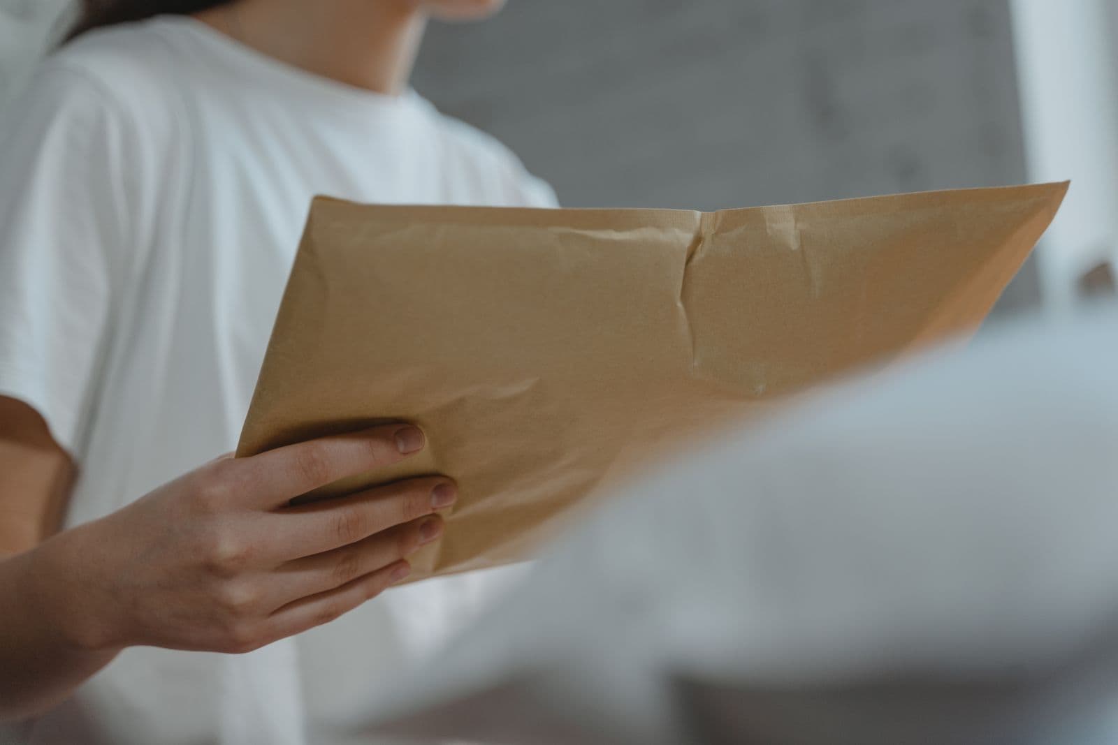 A padded envelope on its way back to the guest who left it